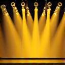 Icon of a live event stage with sound waves emitting.